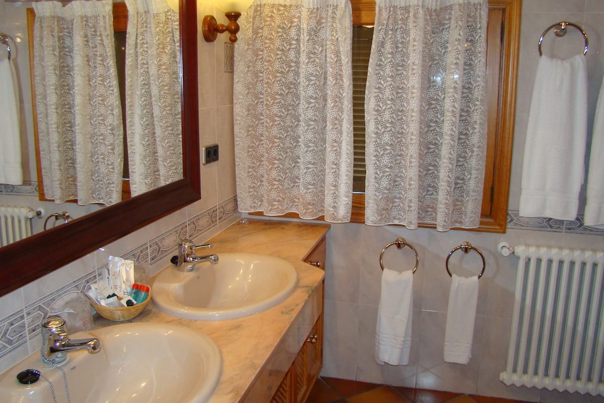 junior suite | bathroom | hair dryer, towels