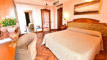 Select Comfort beds, minibar, in-room safe, desk