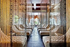 Experience a unique room design with a central pathway leading to a window and geometric-patterned walls.