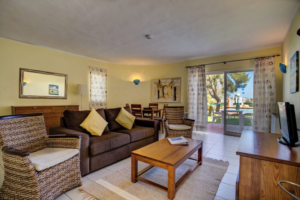 Superior Apartment, 1 Bedroom | Living area | 25-cm TV with satellite channels