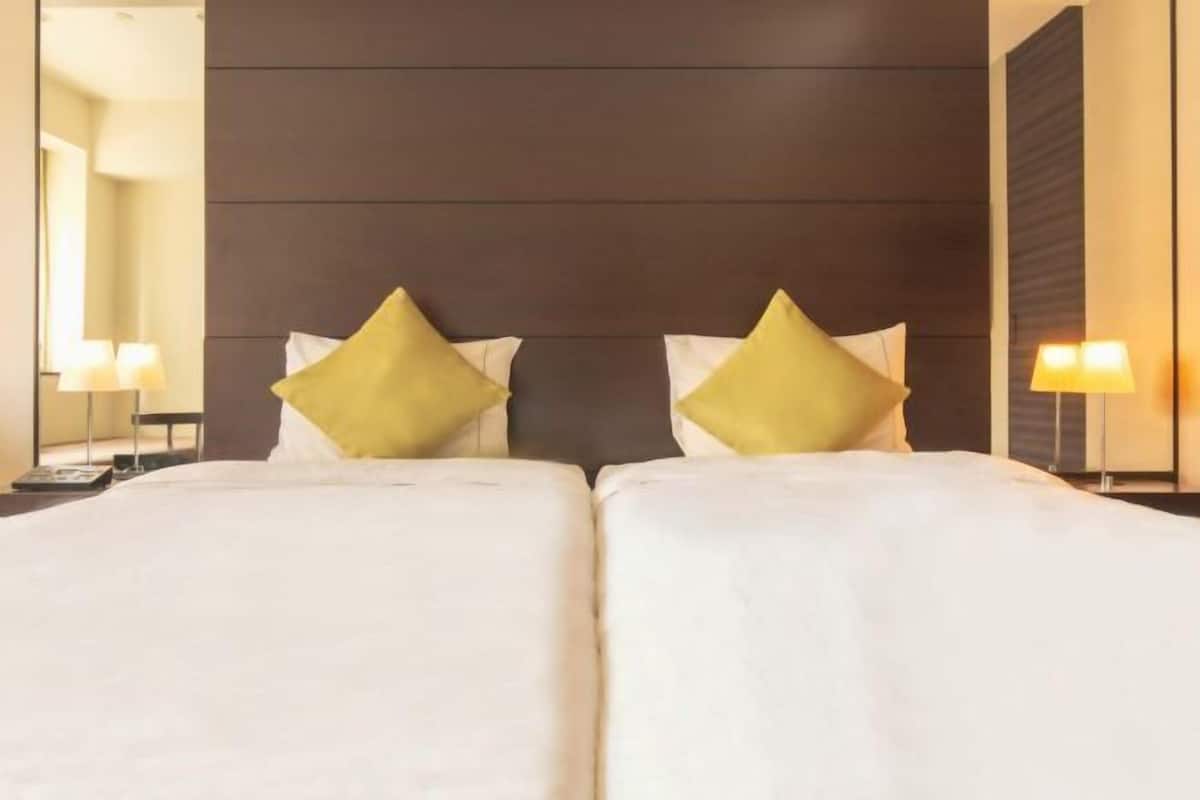 Premium bedding, pillow-top beds, in-room safe, blackout curtains