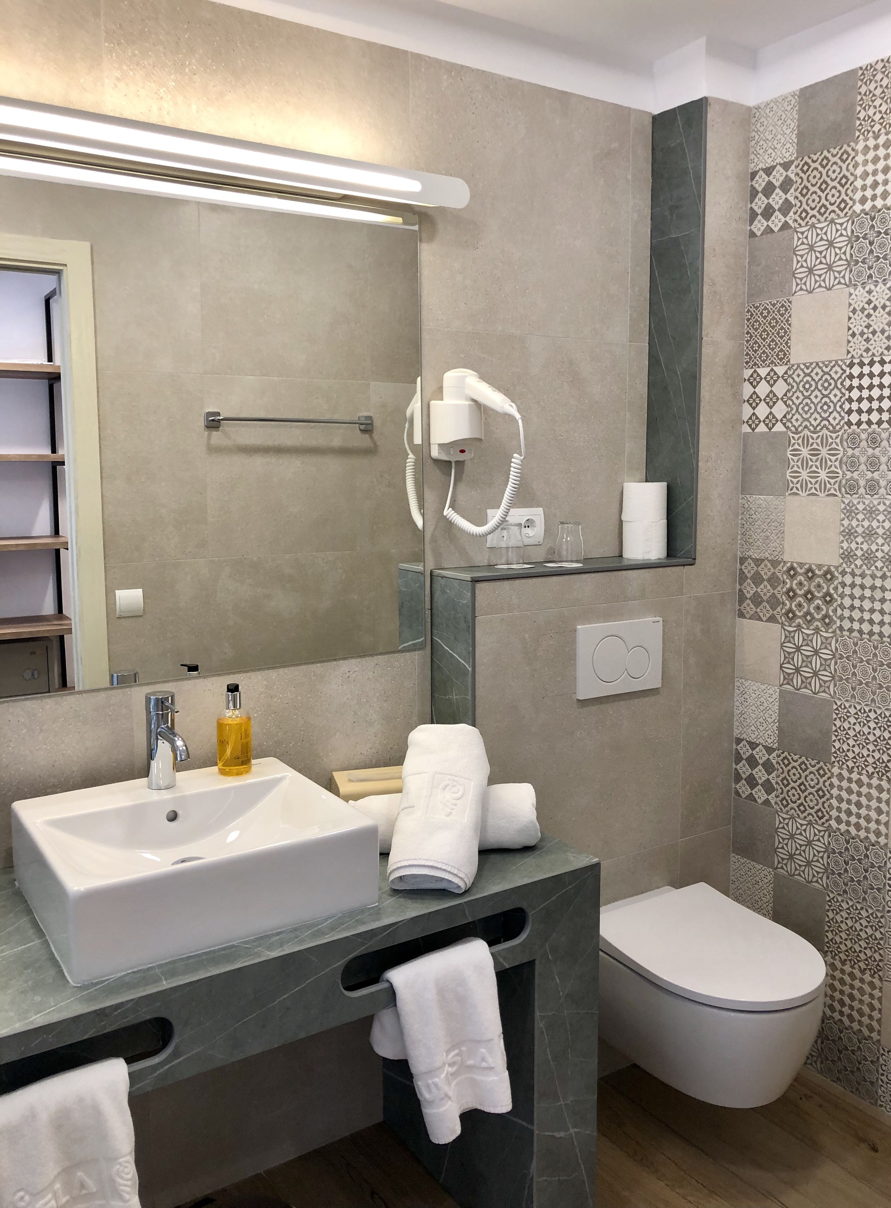 signature double room | bathroom | shower, rainfall showerhead, hair dryer, slippers