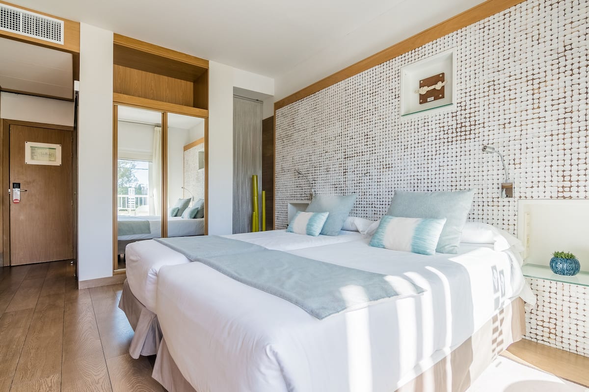 double room, balcony | in-room safe, desk, soundproofing, iron/ironing board