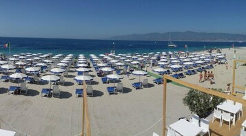 Private beach, sun loungers, beach umbrellas