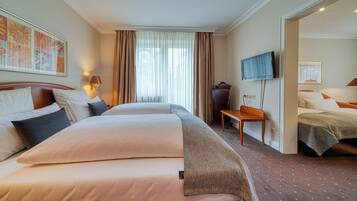 Suite Klasik | 1 kamar tidur, brankas, meja kerja, dan tirai kedap cahaya