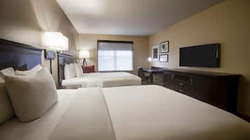 Luxe beddengoed, een bureau, verduisterende gordijnen