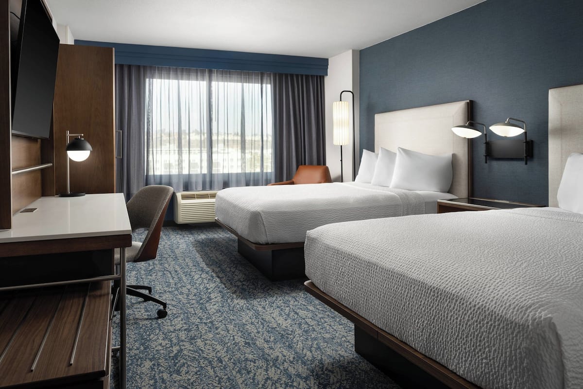 Premium bedding, down comforters, desk, blackout drapes