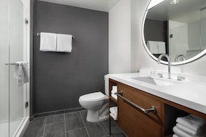 Combined shower/tub, designer toiletries, hair dryer, towels