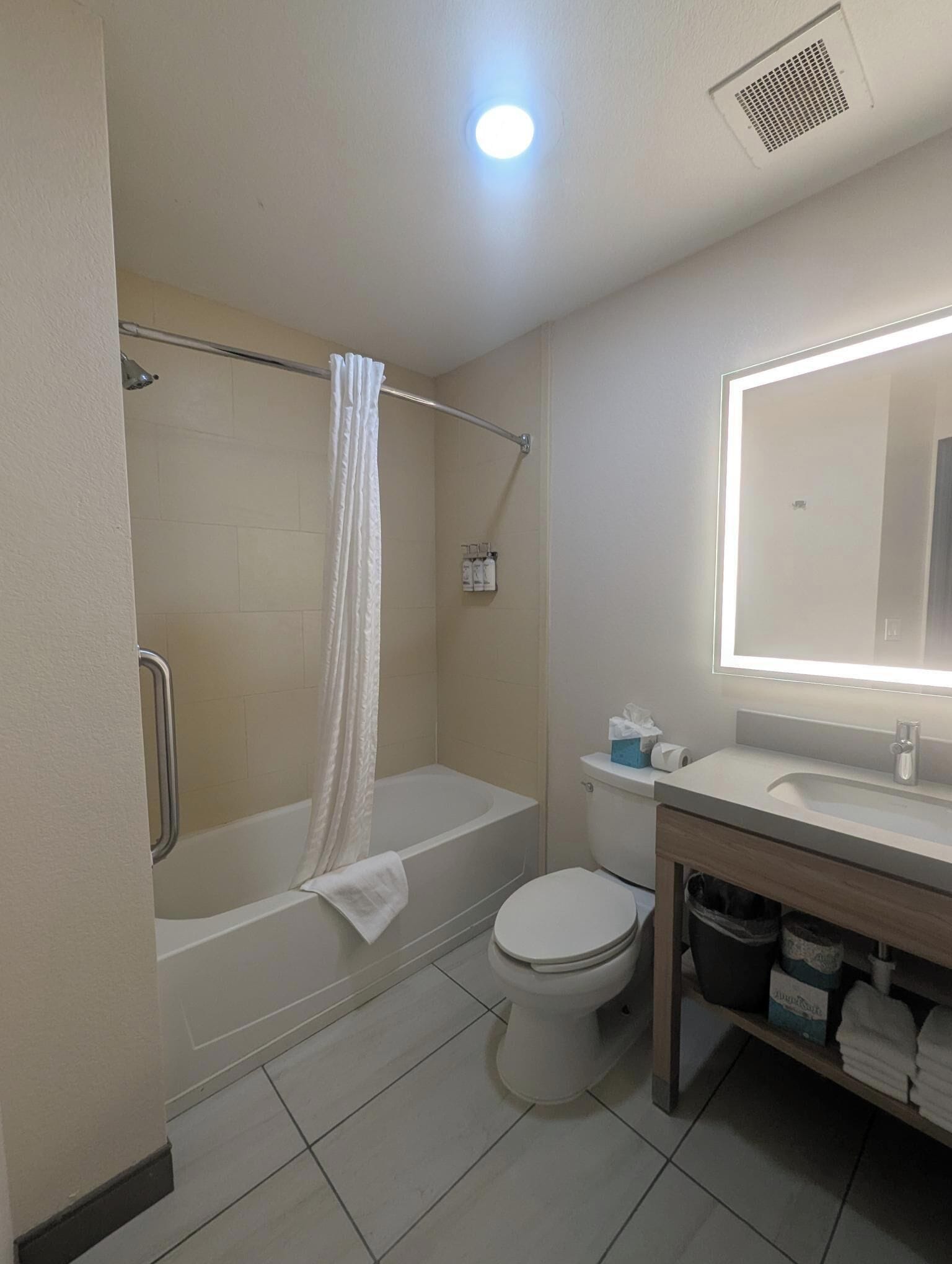 studio suite, 2 queen beds | bathroom | combined shower/bathtub, hair dryer, towels