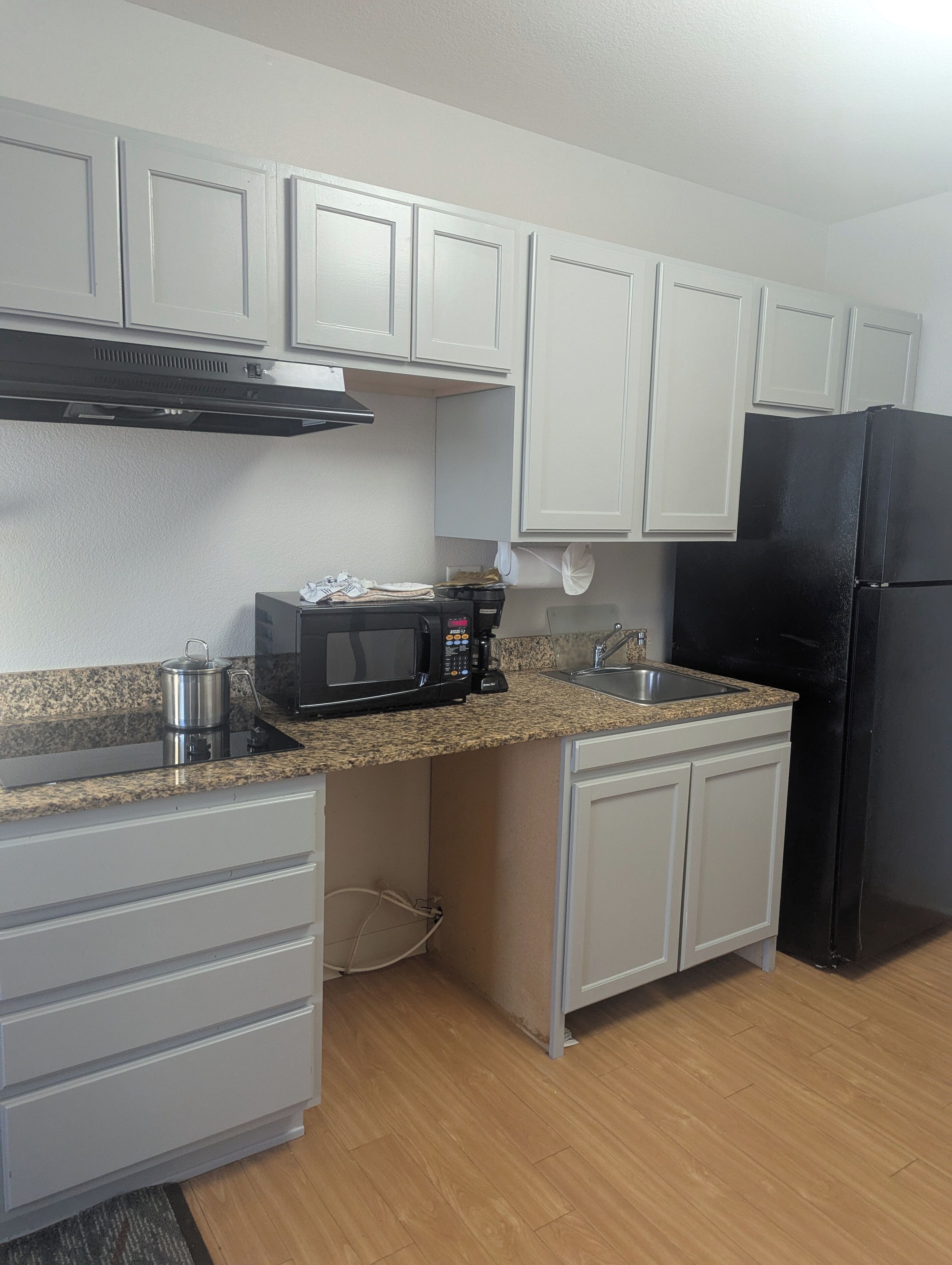 studio suite | private kitchenette | fridge, microwave, coffee/tea maker, cookware/dishes/utensils