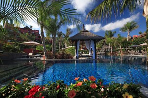 7 outdoor pools, open 11:00 AM to 7:00 PM, pool umbrellas, sun loungers