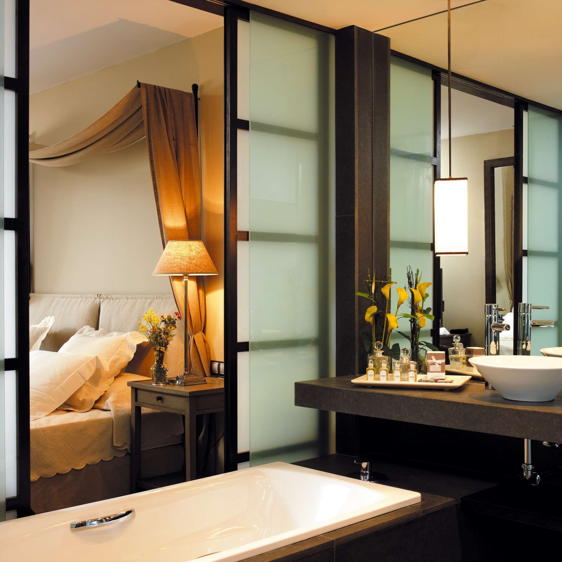 separate bathtub and shower, free toiletries, hair dryer, slippers