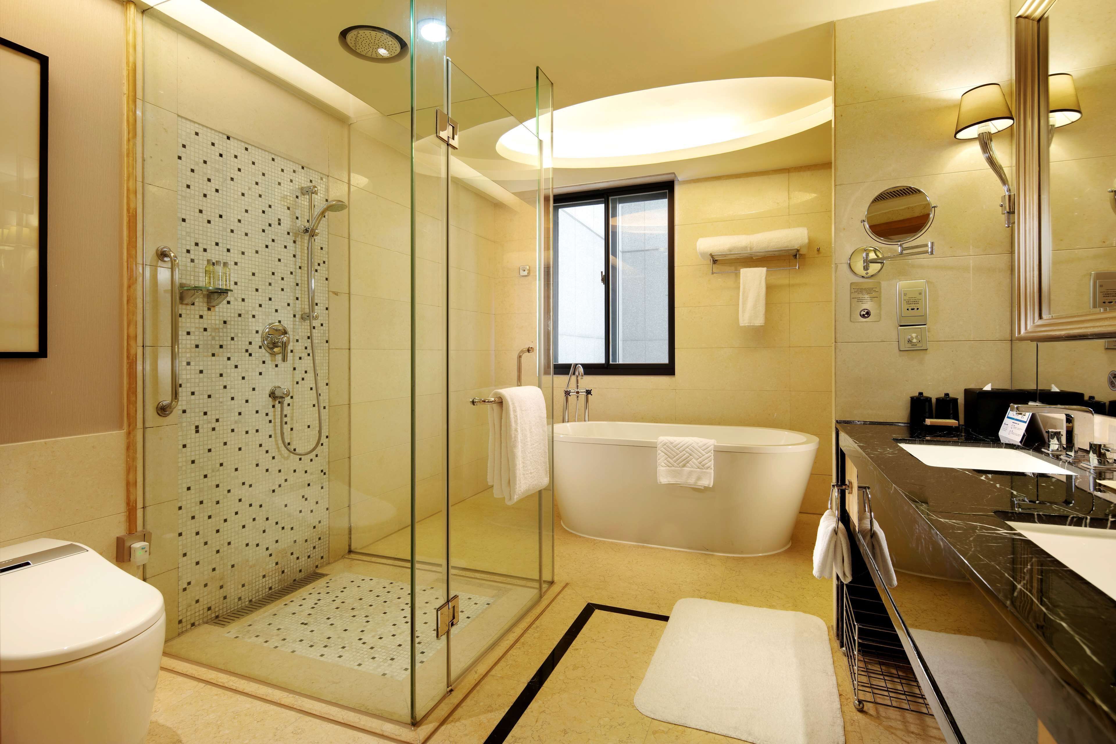 executive room, 1 king bed (premium) | bathroom | separate bathtub and shower, rainfall showerhead, designer toiletries