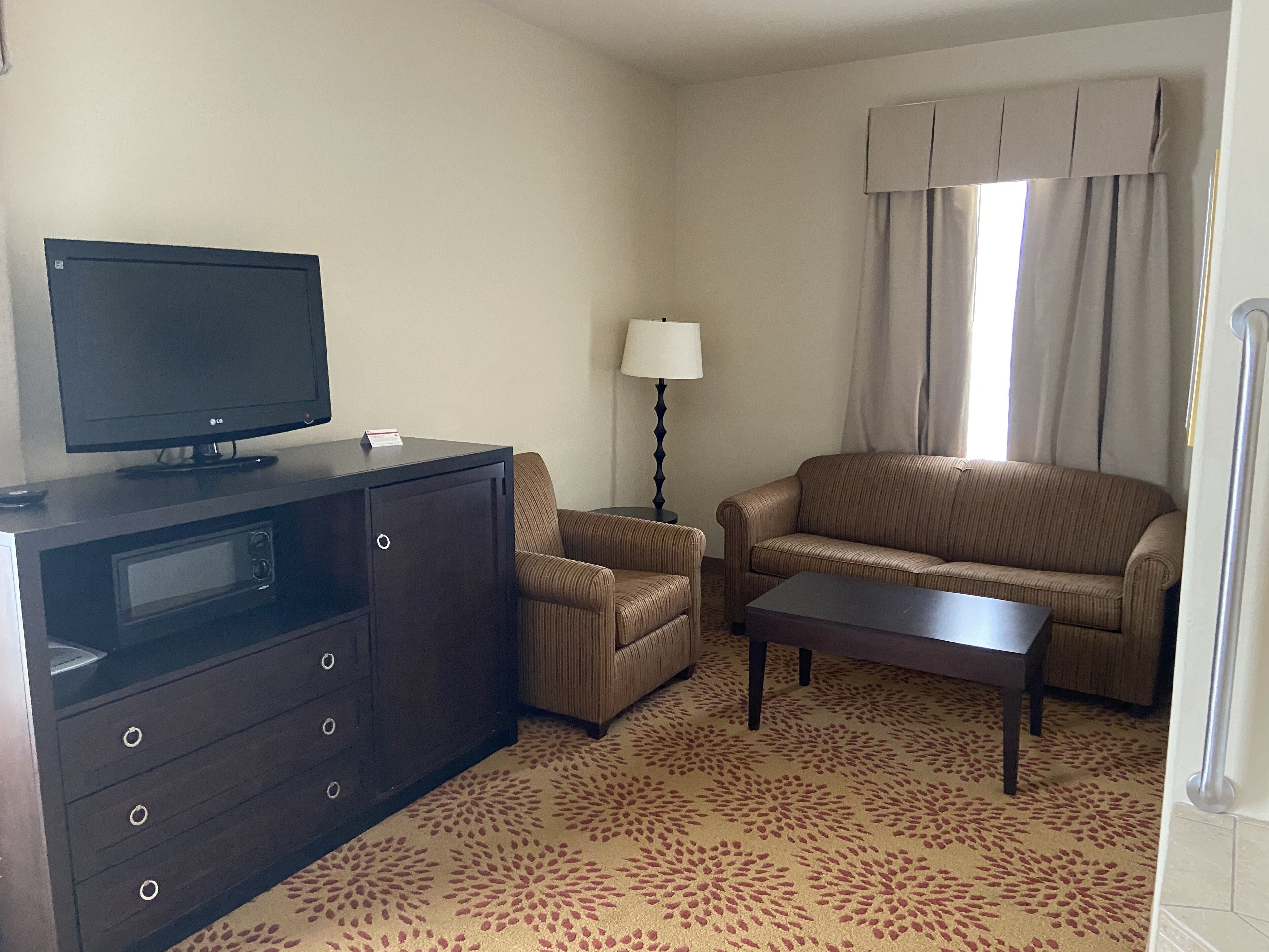 suite, 1 king bed, jetted tub (separate walk-in shower) | 1 bedroom, premium bedding, in-room safe, desk