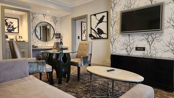 Suite | In-room safe, desk, laptop workspace, soundproofing