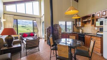 Deluxe Chalet | Private kitchen | Full-size fridge, microwave, oven, stovetop