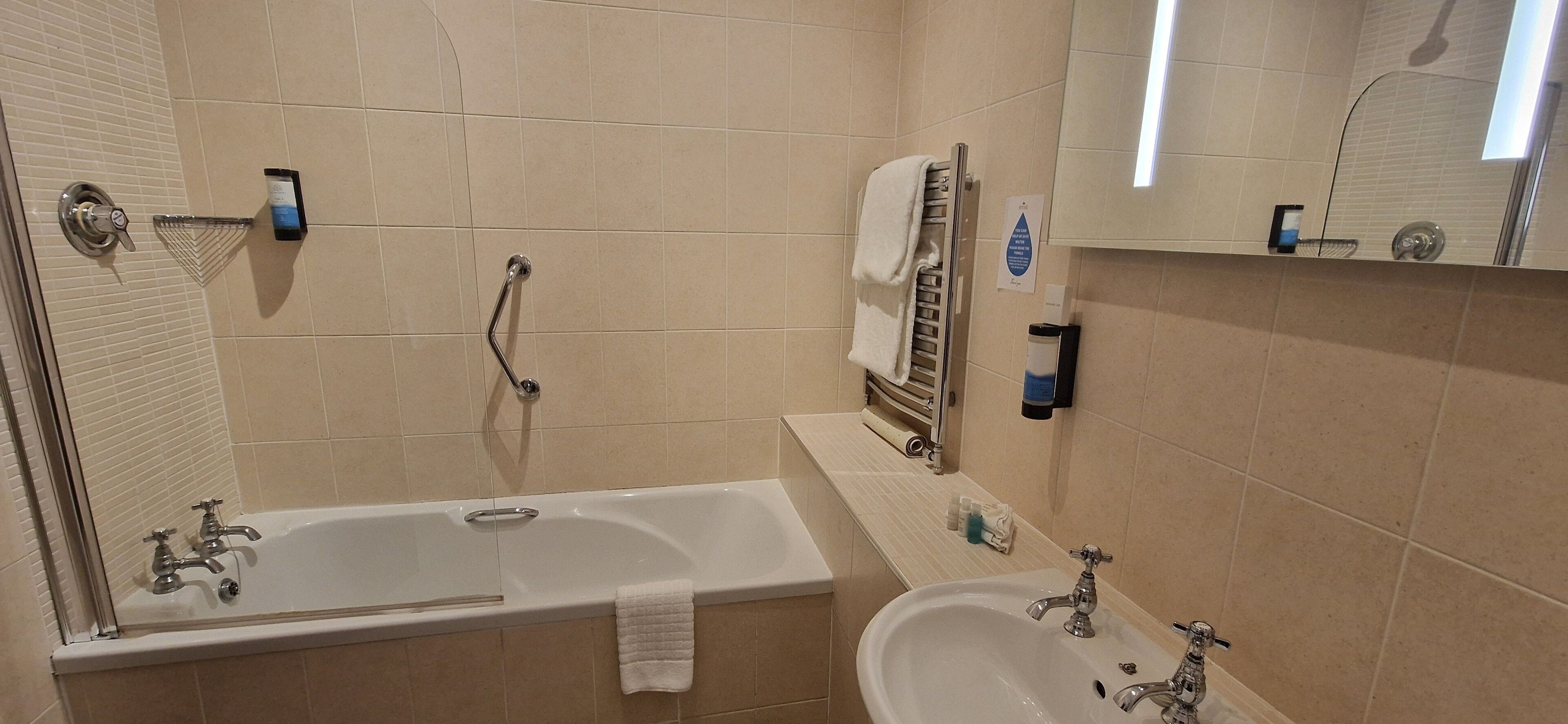 combined shower/bathtub, free toiletries, hair dryer, towels