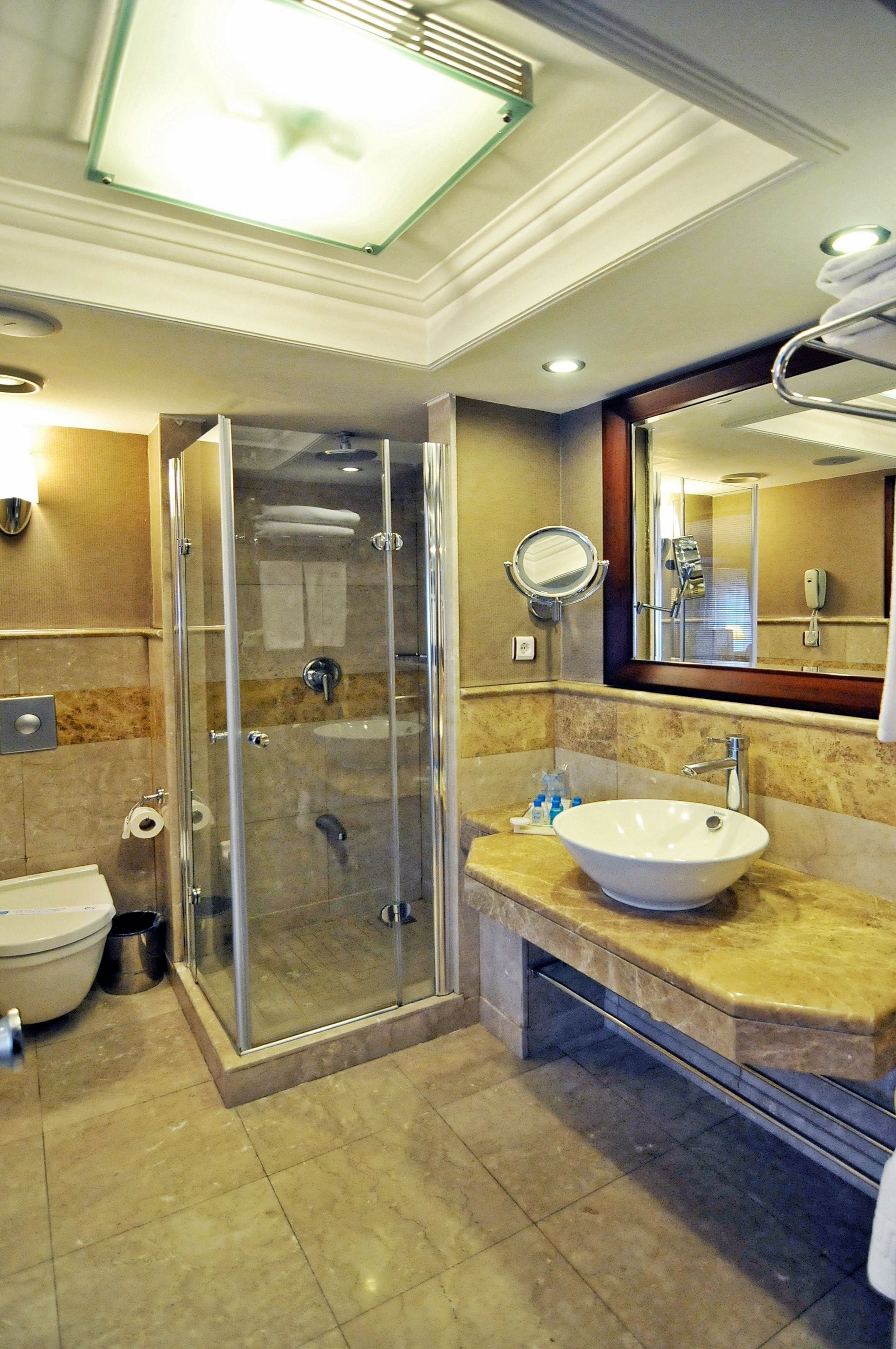 eco-friendly toiletries, hair dryer, slippers, towels