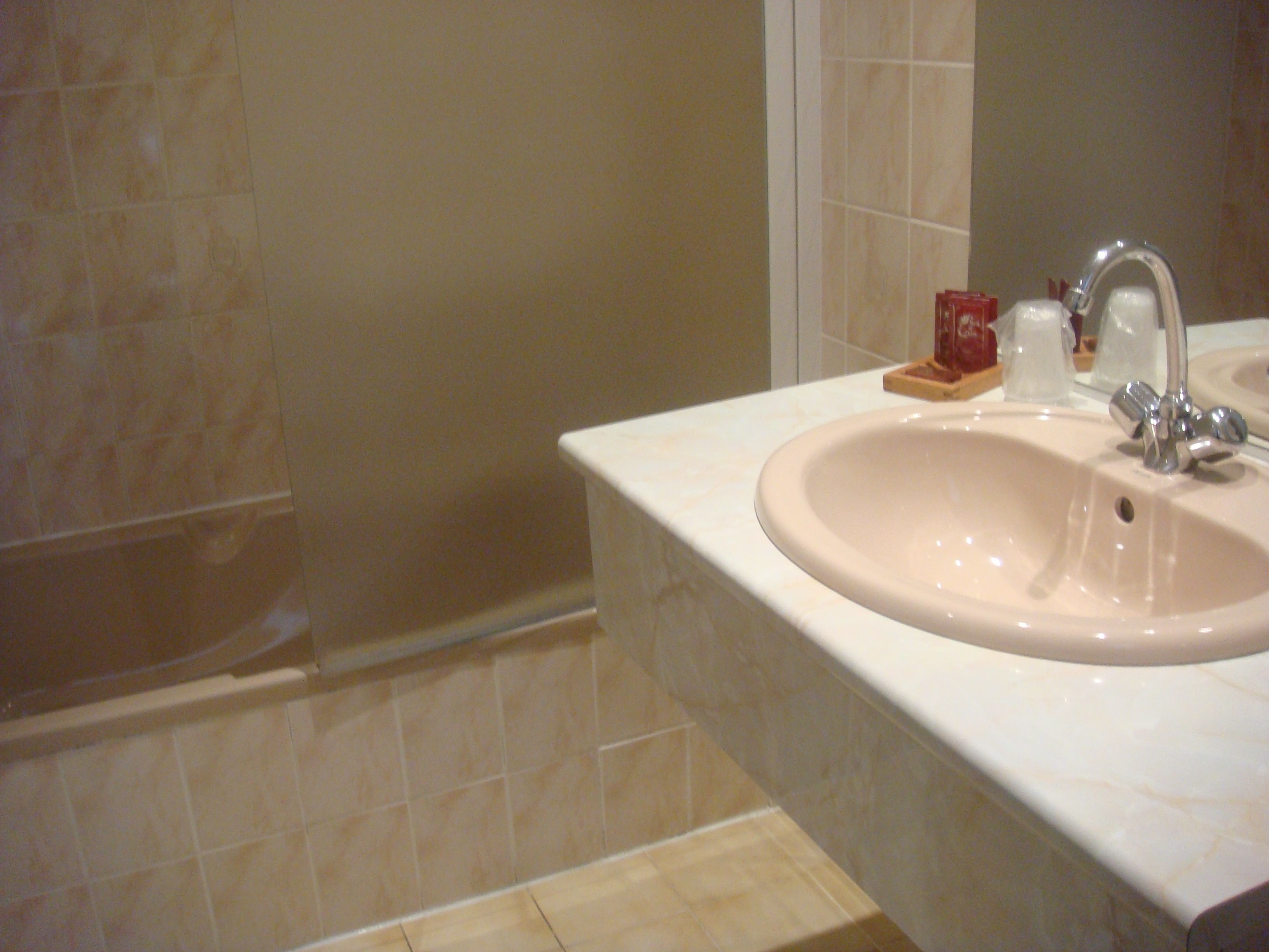 comfort double room, refrigerator & microwave | bathroom | towels