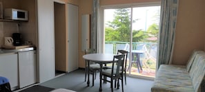 Comfort Room, Refrigerator & Microwave | In-room dining - Hotel La Chaumiere (Saint-Jean-de-Monts)