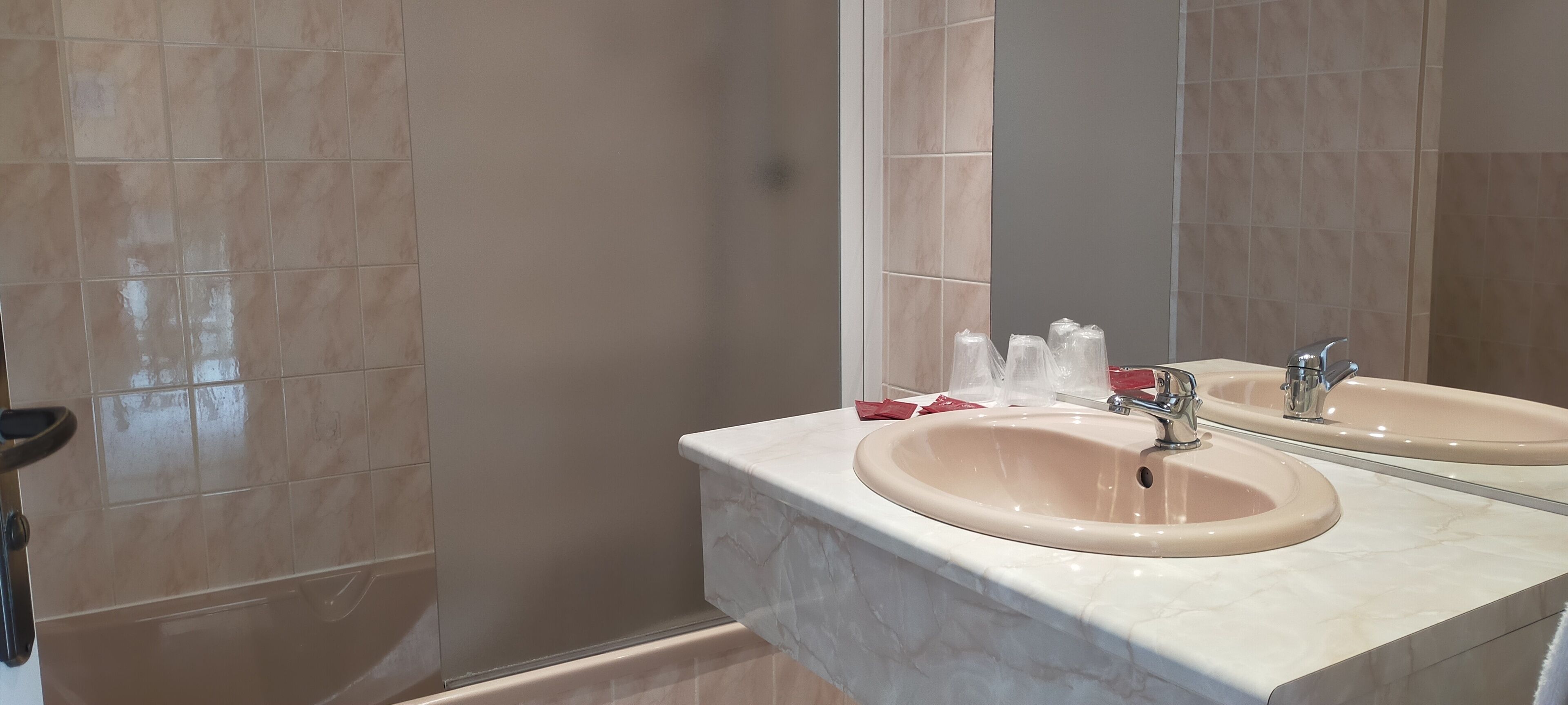 comfort room, refrigerator & microwave | bathroom sink