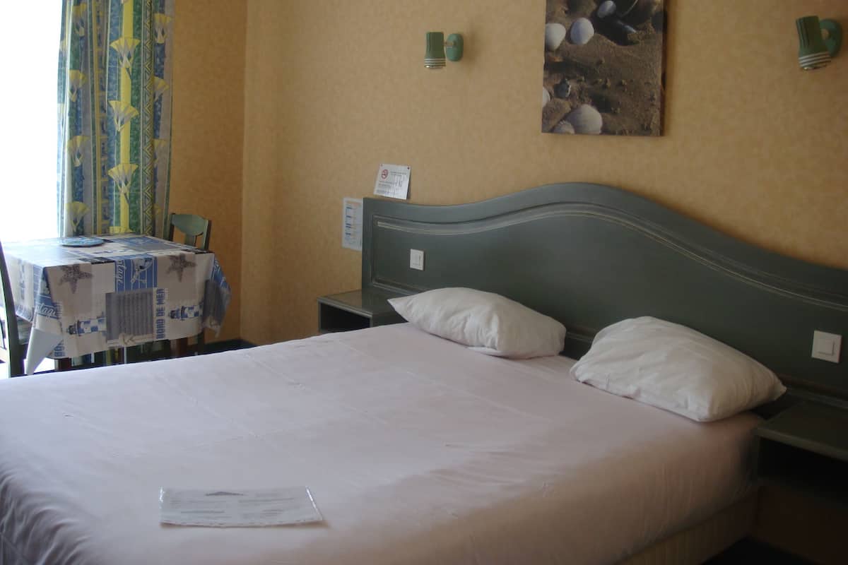 Habitación Confort doble, frigorífico y microondas | Ropa de cama