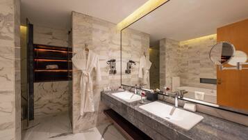 Deep soaking tub, hair dryer, bathrobes, slippers