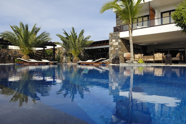 Outdoor pool, pool umbrellas, sun loungers