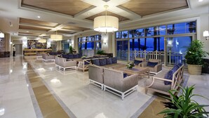 A spacious lobby with modern furniture, large windows, and a wooden ceiling. - Quadas Hotel - Adults Only - All inclusive (Marmaris)