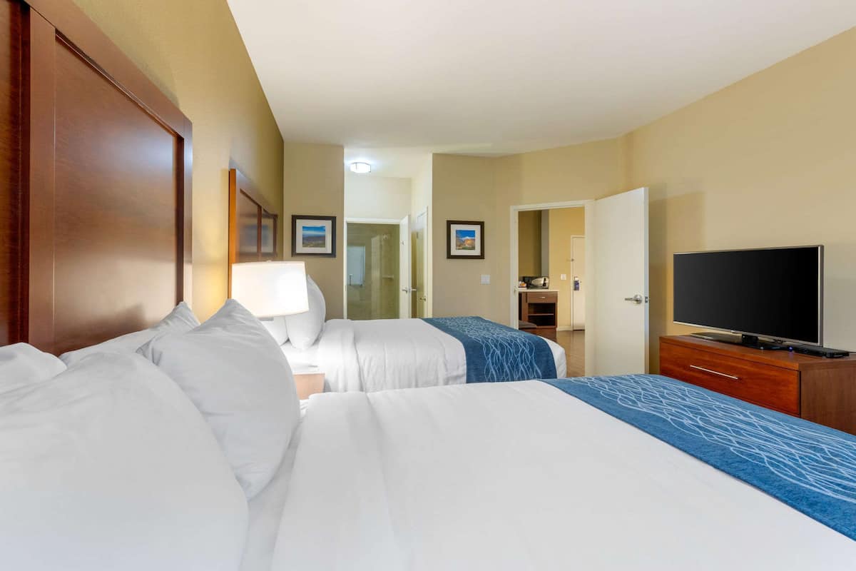 suite, 2 queen beds, non smoking | 1 bedroom, pillow-top beds, in-room safe, desk