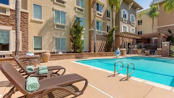 Outdoor pool, pool umbrellas, pool loungers