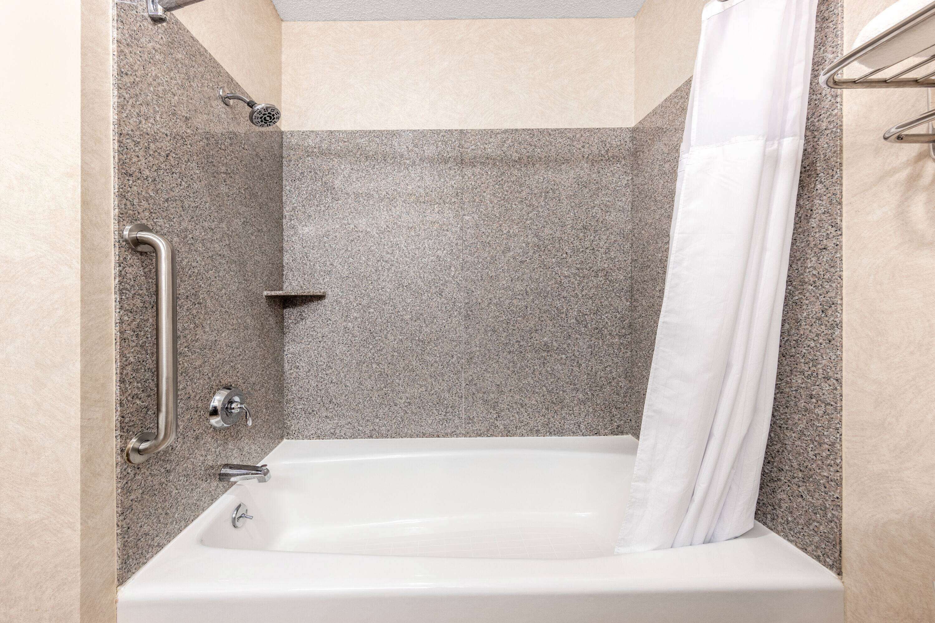 combined shower/bathtub, free toiletries, hair dryer, towels