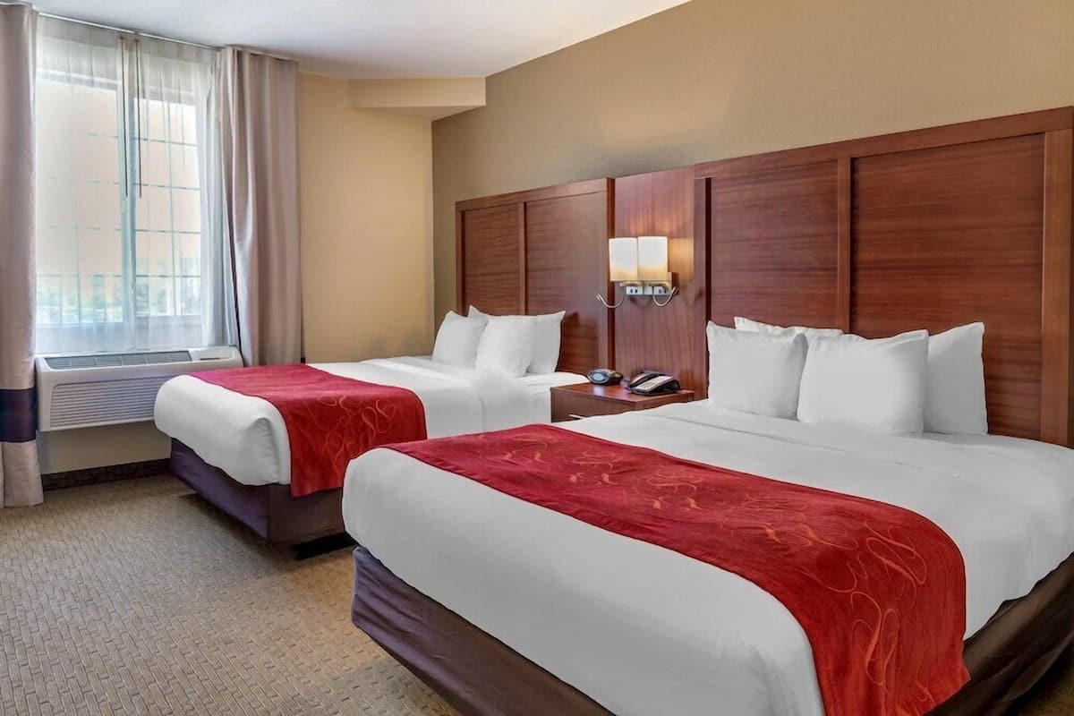 Premium bedding, pillow-top beds, desk, blackout curtains
