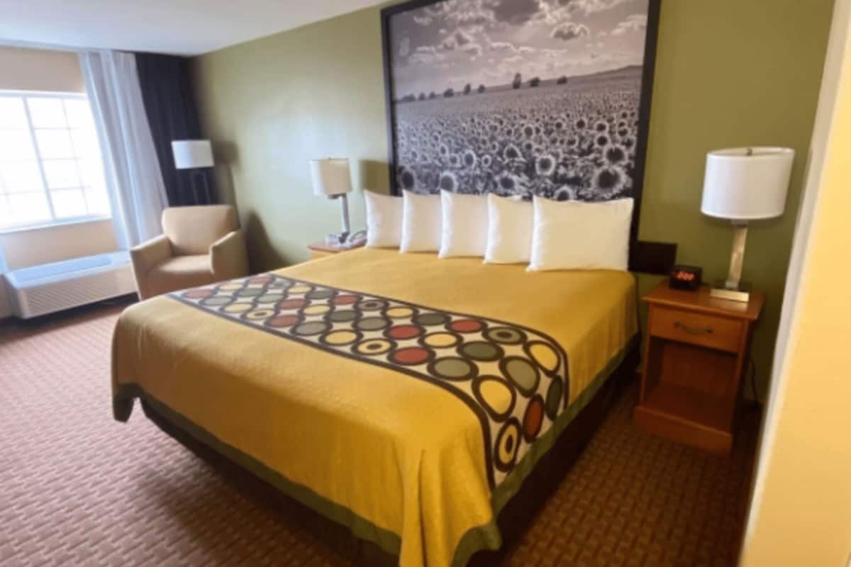 premium bedding, desk, laptop workspace, blackout curtains