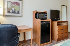 Premium bedding, desk, laptop workspace, blackout curtains