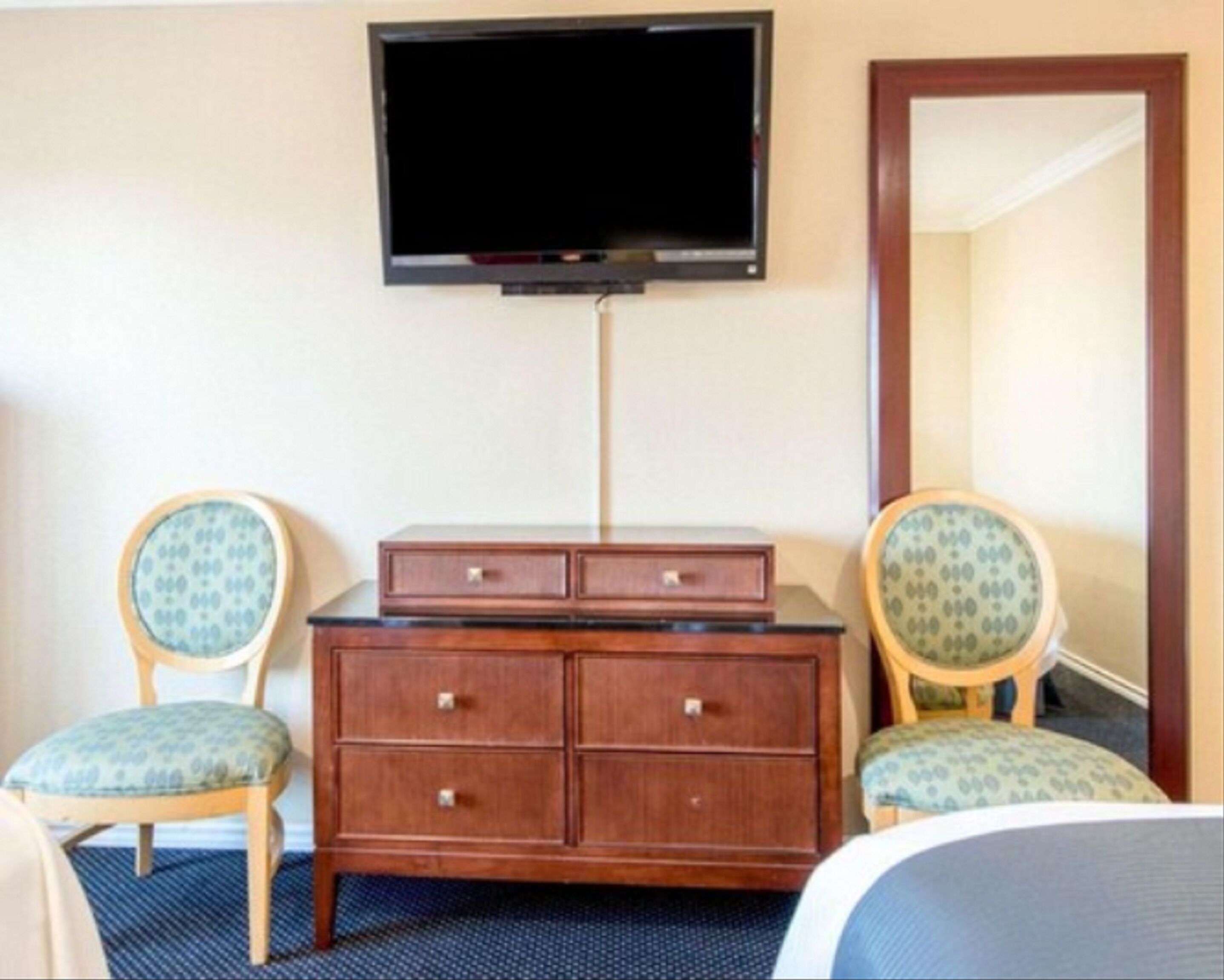 family room, 2 queen beds, refrigerator & microwave, city view | desk, rollaway beds, free wifi