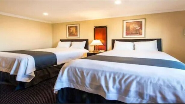 Unclassified image, 1 of 14, button - Queencity Inn (Signal Hill)