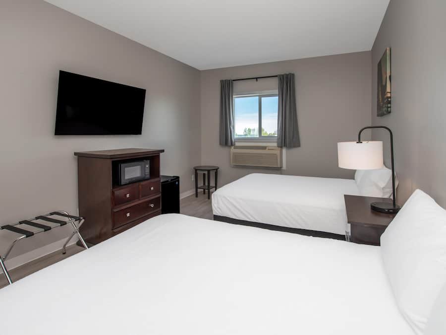 Premium bedding, individually furnished, desk, laptop workspace