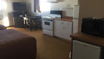 Standard Room, 2 Queen Beds, Non Smoking | Private kitchen | Mini-fridge, microwave, dining tables