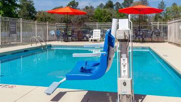 Seasonal outdoor pool, open 10:00 AM to 10:00 PM, pool loungers