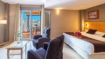 Junior Suite, Terrace | Minibar, in-room safe, desk, soundproofing