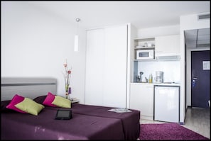 Comfort Studio | Blackout drapes, soundproofing, iron/ironing board
