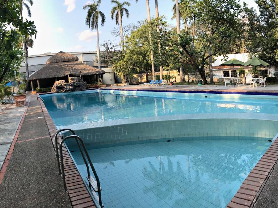 Outdoor pool, open 8:30 AM to 10:30 PM, pool umbrellas
