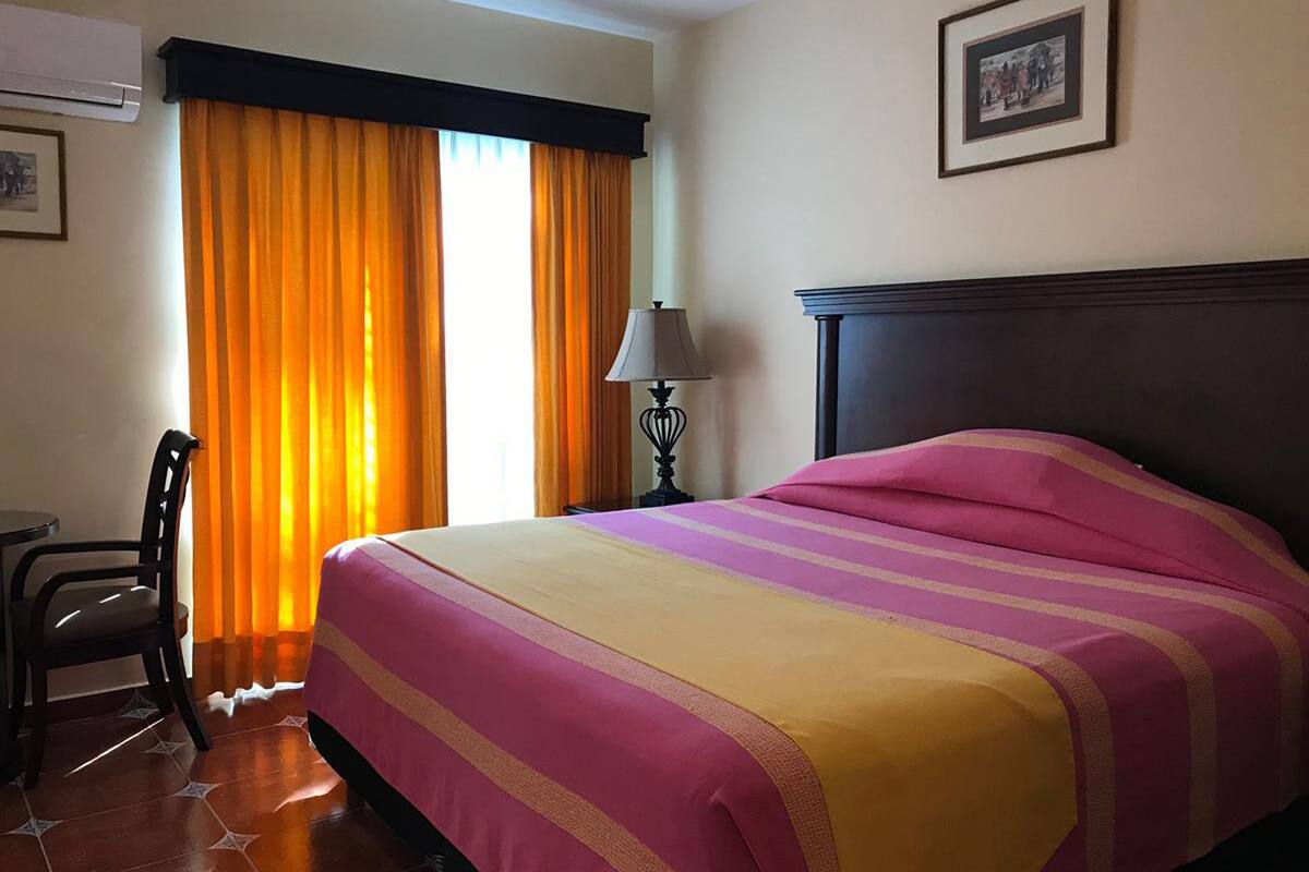 junior suite, 1 king bed, non smoking | down duvets, in-room safe, blackout curtains, iron/ironing board