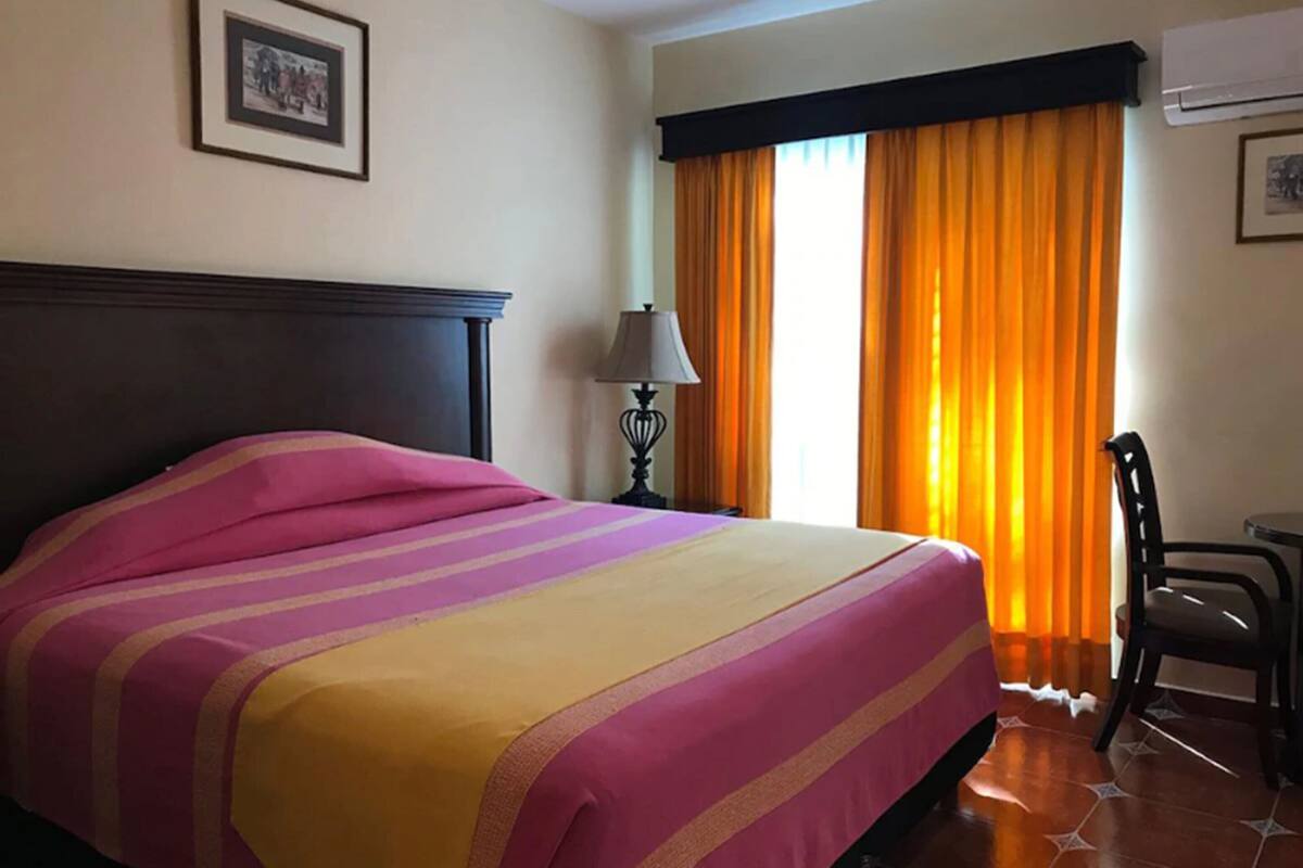 junior suite, 1 king bed, non smoking | down duvets, in-room safe, blackout curtains, iron/ironing board