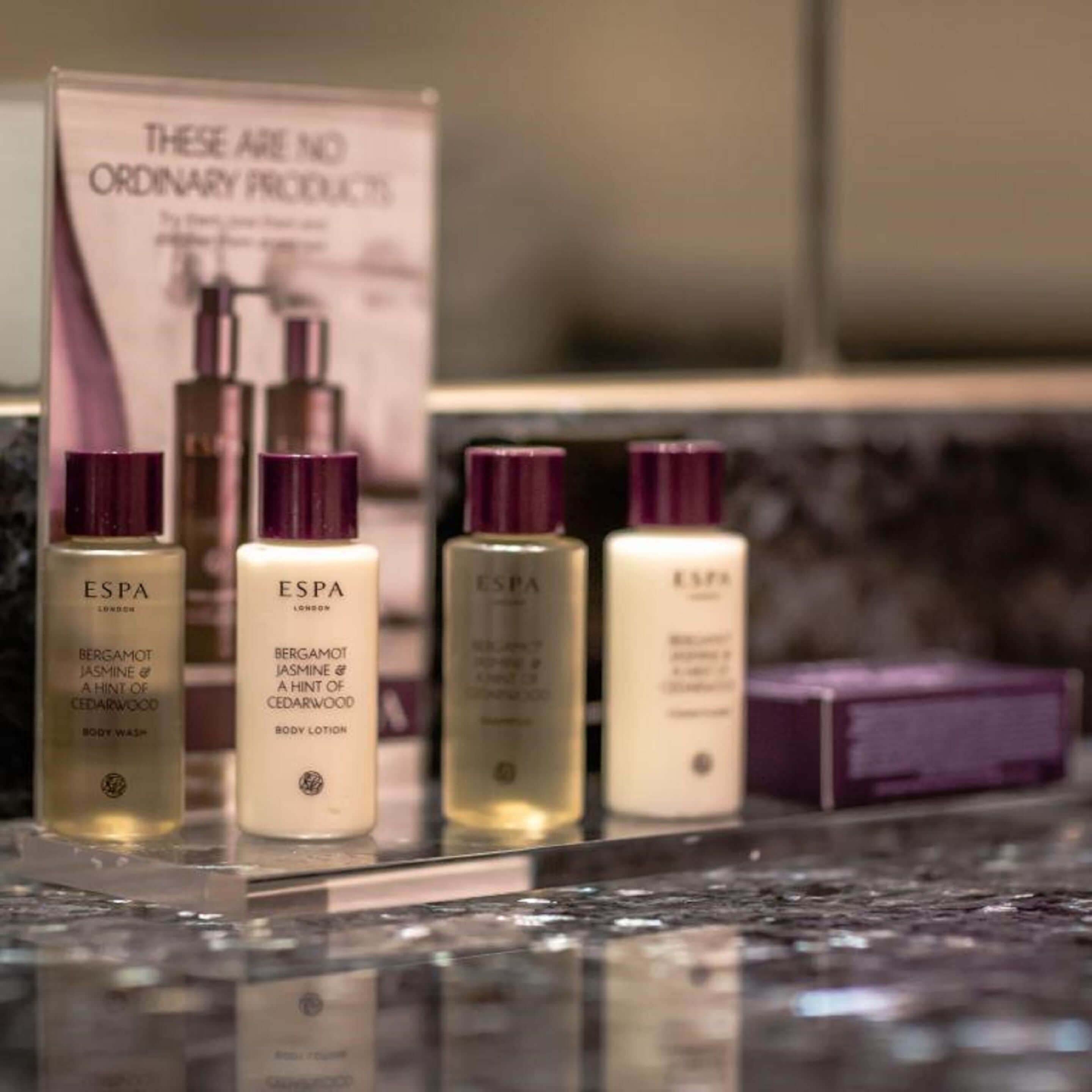 A selection of ESPA body care products on a countertop.
