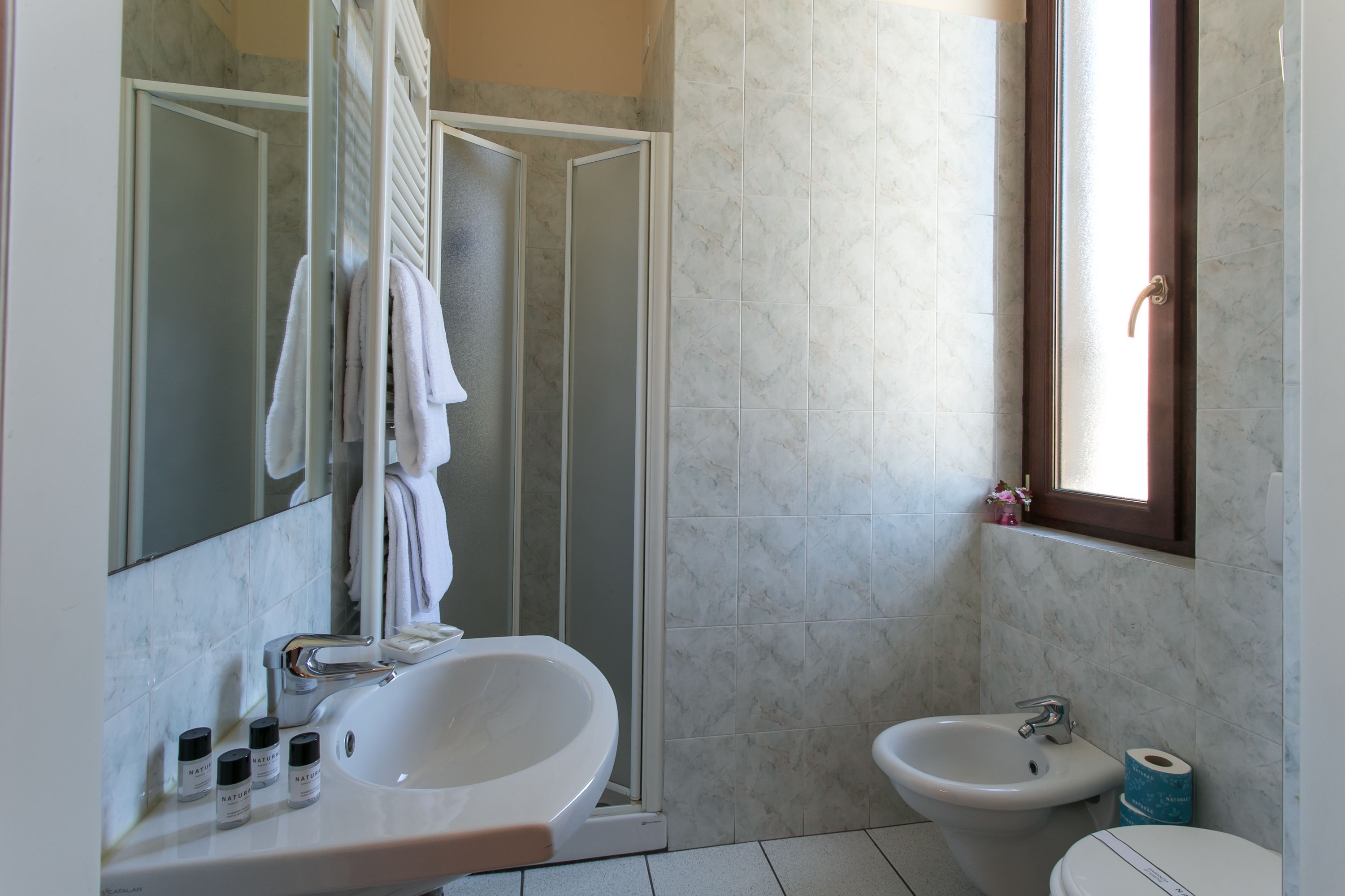 comfort quadruple room | bathroom | shower, hair dryer, slippers, towels