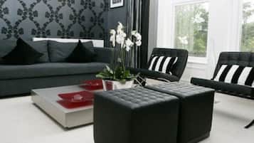 Double Room | Living room | Flat-screen TV