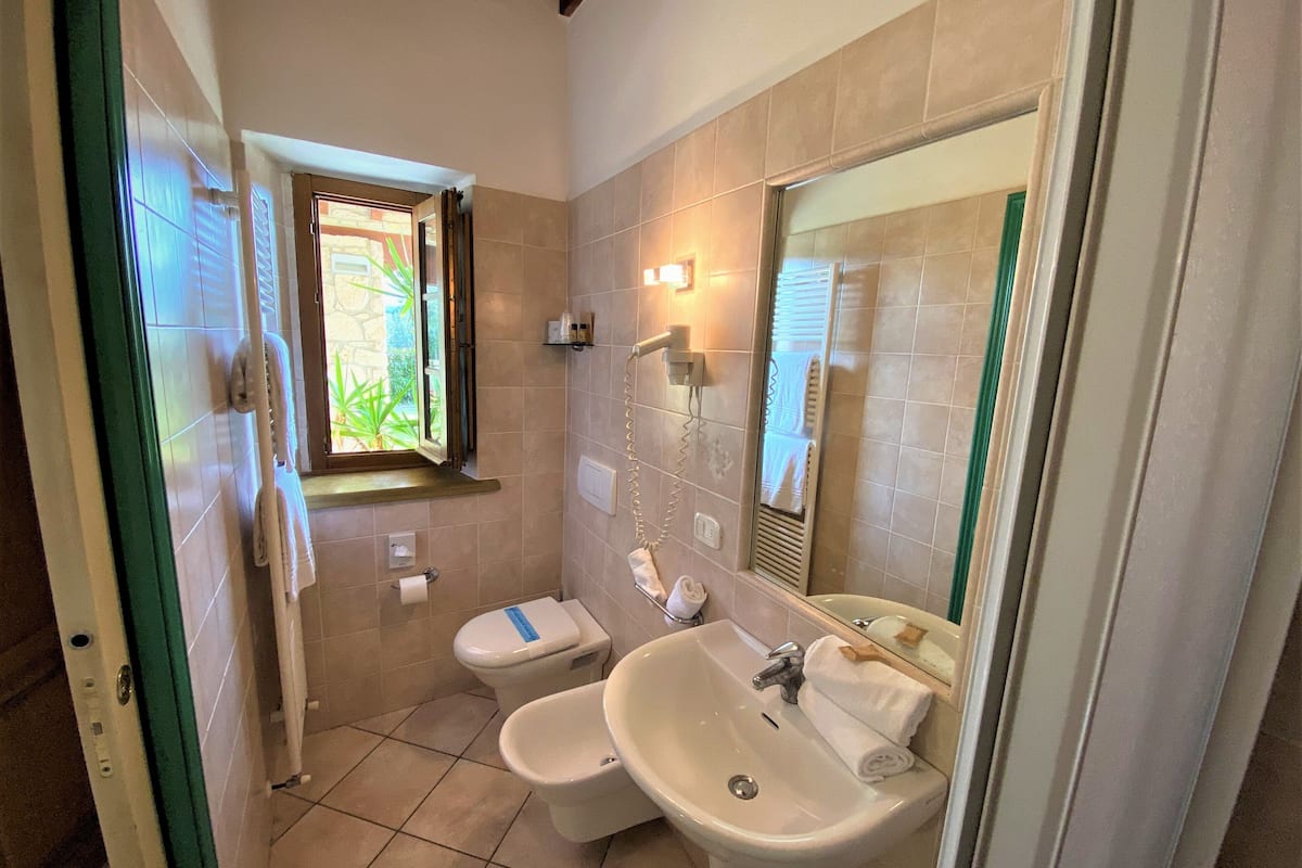 family room | bathroom | shower, hair dryer, towels
