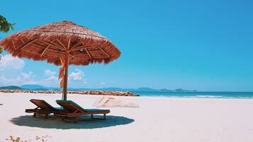 Private beach, white sand, sun-loungers, beach umbrellas